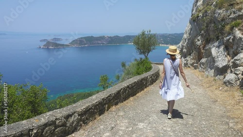 young woman going to the summer beach