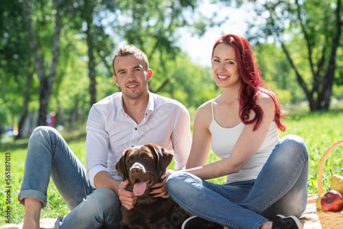 Couple with a dog in the park