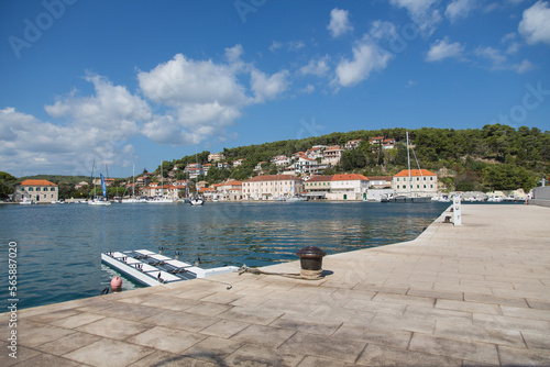 Fototapeta Naklejka Na Ścianę i Meble -  At the harbor of Jelsa - red letters as a sign or symbol introducing the village on the island Hvar, Croatia