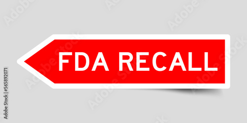 Red color arrow shape sticker label with word FDA recall on gray background