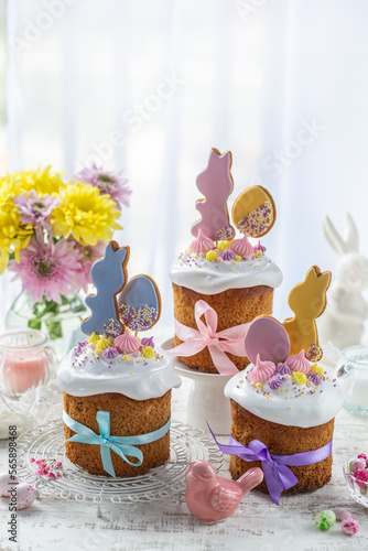 Photography Beautiful festive table with traditional  easter bread kulich