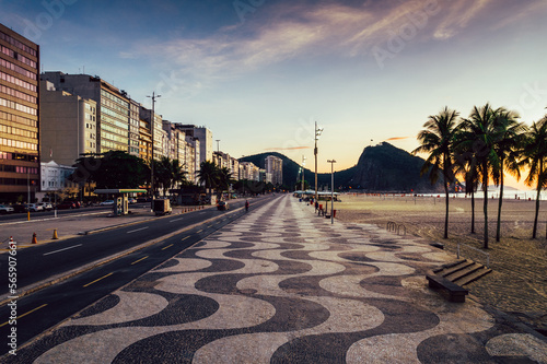 Empty wavy mosaic pattern of sidewalk in Leme, Copacabana, Rio de Janeiro, Brazil at sunrise