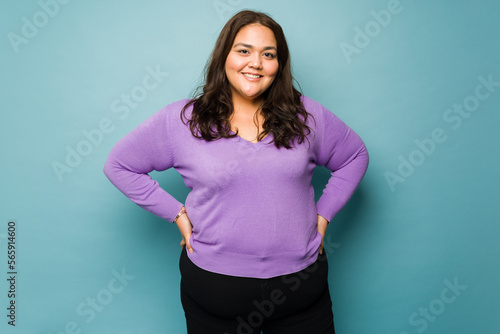 Beautiful obese woman smiling making eye contact photo