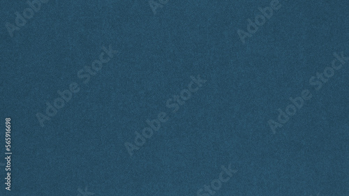 Dark blue colored paper texture. Tinted background. Textured wallpaper. Large patterned surface. Fibers and irregularities are visible. Top-down