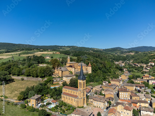 Wine making region Beaujolais Pierre dorees wioth yellow houses and hilly vineyards, aerial view, France