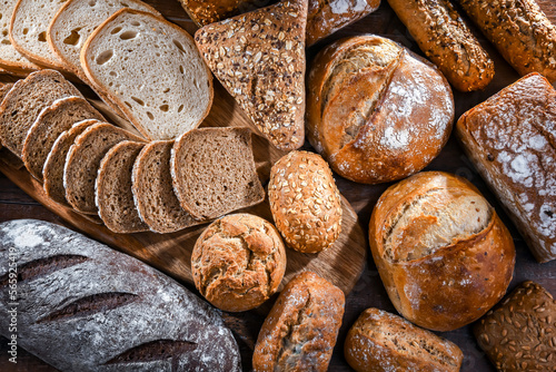 Assorted bakery products including loafs of bread and rolls