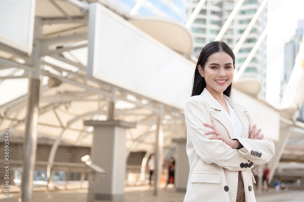 Portrait of young beautiful businesswoman in modern city Portrait of young beautiful businesswoman in modern city