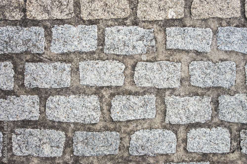 Old cobblestone pavement background texture Old cobblestone pavement background texture