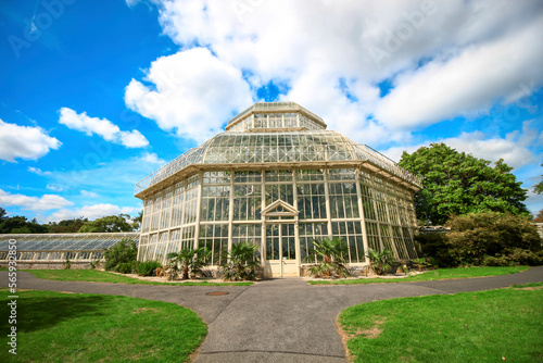 DUBLIN, IRELAND - AUGUST 4, 2022: A glasshouse of The National Botanic Gardens in Dublin, Ireland in a sunny day with blue sky.