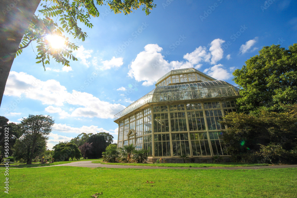 DUBLIN, IRELAND - AUGUST 4, 2022: A glasshouse of The National Botanic Gardens in Dublin, Ireland in a sunny day with blue sky.