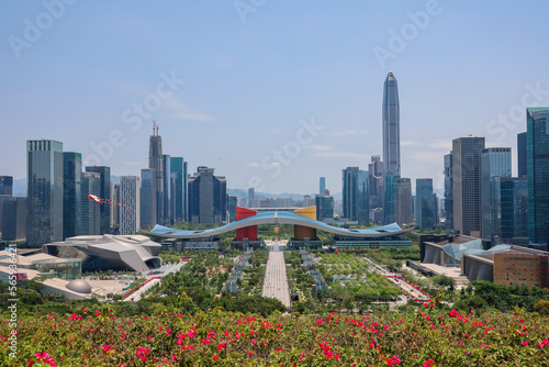 SHENZHEN, CHINA - MAY 2019 - View of the iconic Civic Centre building from Lianhuashan Park on a sunny day, Shenzhen, Guandong Province, China. © Davi Costa