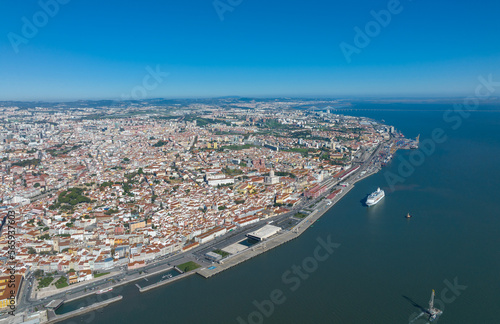 Lisbon City Downtown and City Center, Portugal. Drone Point of View. Sightseeing Places and Famous Architecture Buildings. River Tagus in Background