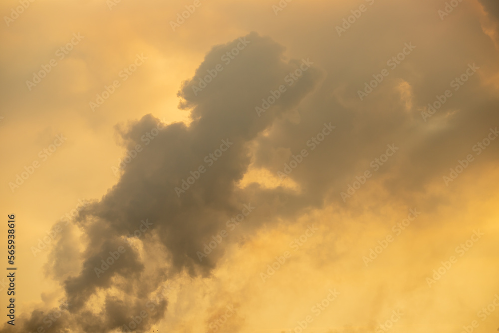 Yellow sky with smoke from fire, sky background.