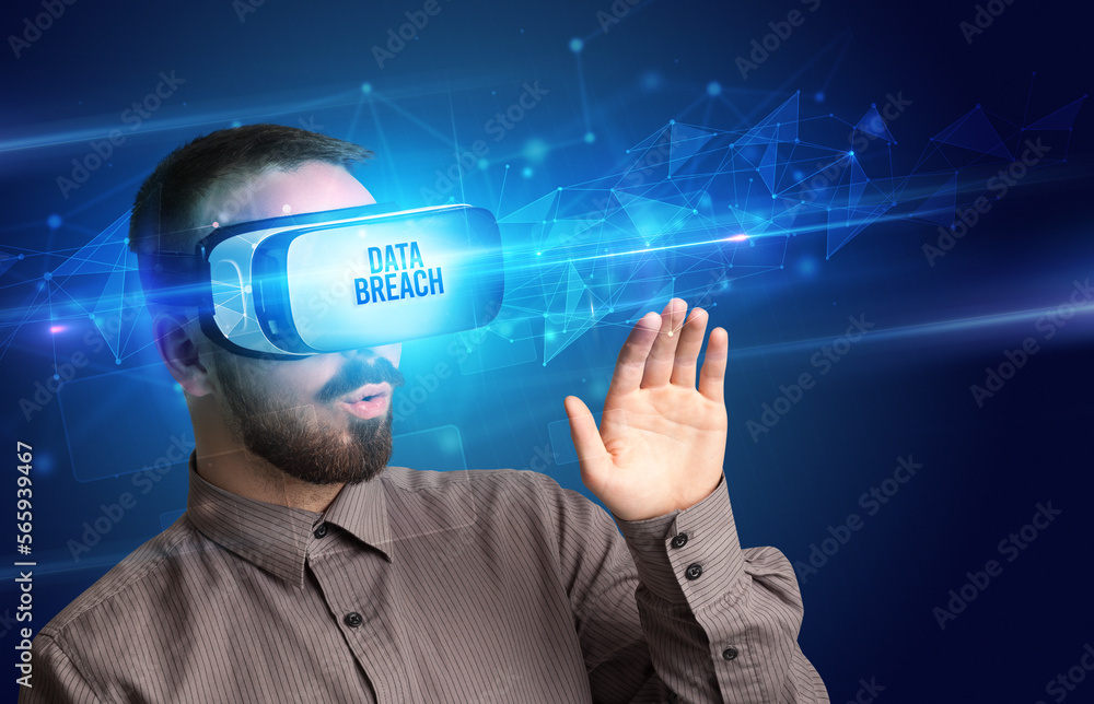 Businessman looking through Virtual Reality glasses, virtual security concept Businessman looking through Virtual Reality glasses, virtual security concept