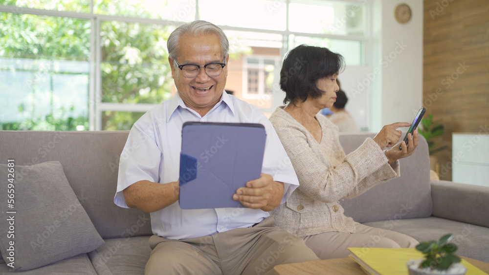 Frustrated angry Asian couple dissatisfied or fight with her technology device, couple senior elderly patient person in nursing home in medical healthcare. People lifestyle. Family wife and husband Frustrated angry Asian couple dissatisfied or fight with her technology device, couple senior elderly patient person in nursing home in medical healthcare. People lifestyle. Family wife and husband