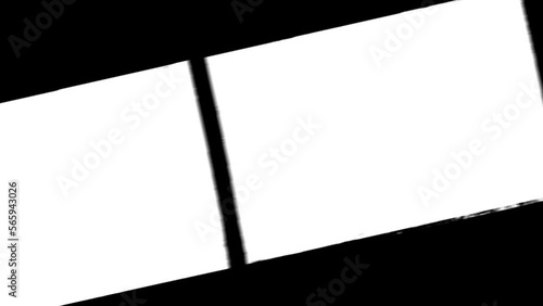 moving or animated 35mm film strip with luma mask, real scan of film material with cool scanning light interferences on the material. cool video transition, HD Footage.
