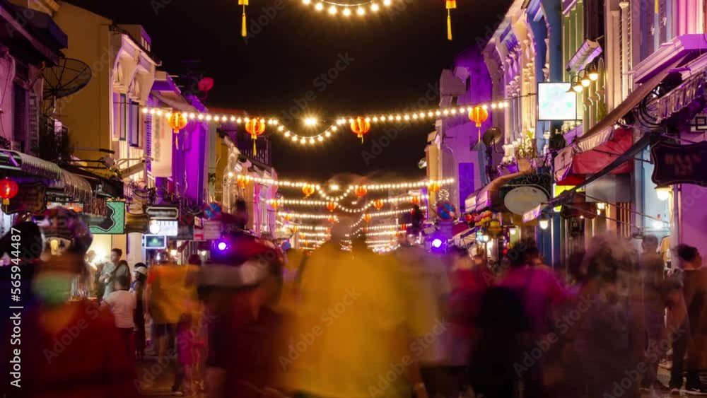 timelapse landscape night view with light illumination on the colonial architecture building with crowded people in Phuket Festival 2023 night time timelapse landscape night view with light illumination on the colonial architecture building with crowded people in Phuket Festival 2023 night time