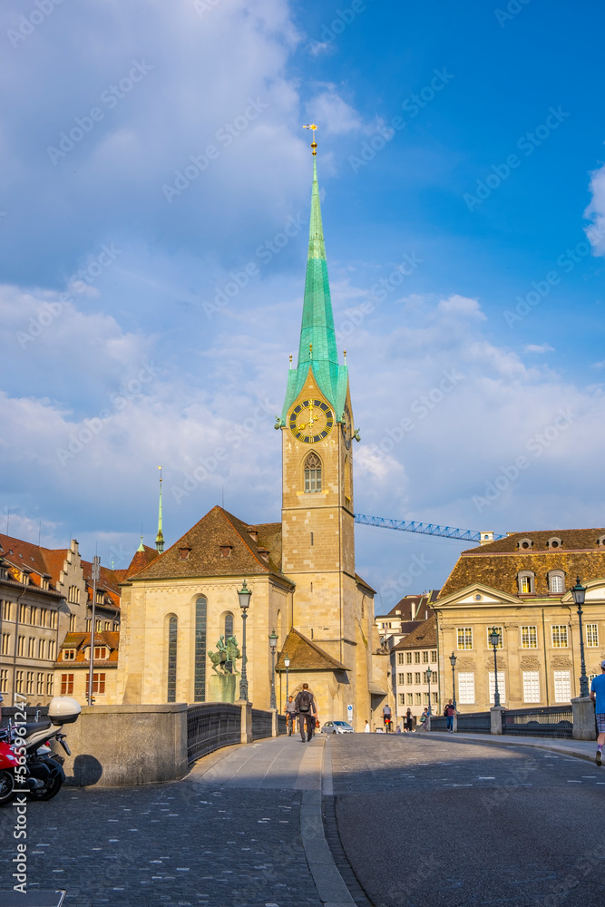 Scenic panoramic view of historic Zürich city center with famous Fraumünster and Grossmünster Church and river Limmat at Lake Zurich on a beautiful sunny day with blue sky in summer, Switzerland