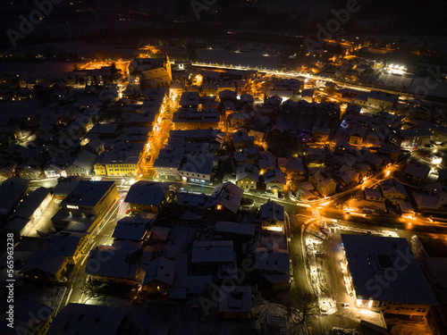Aerial View of the small town Kuchl at night in Winter near Salzburg, Austria