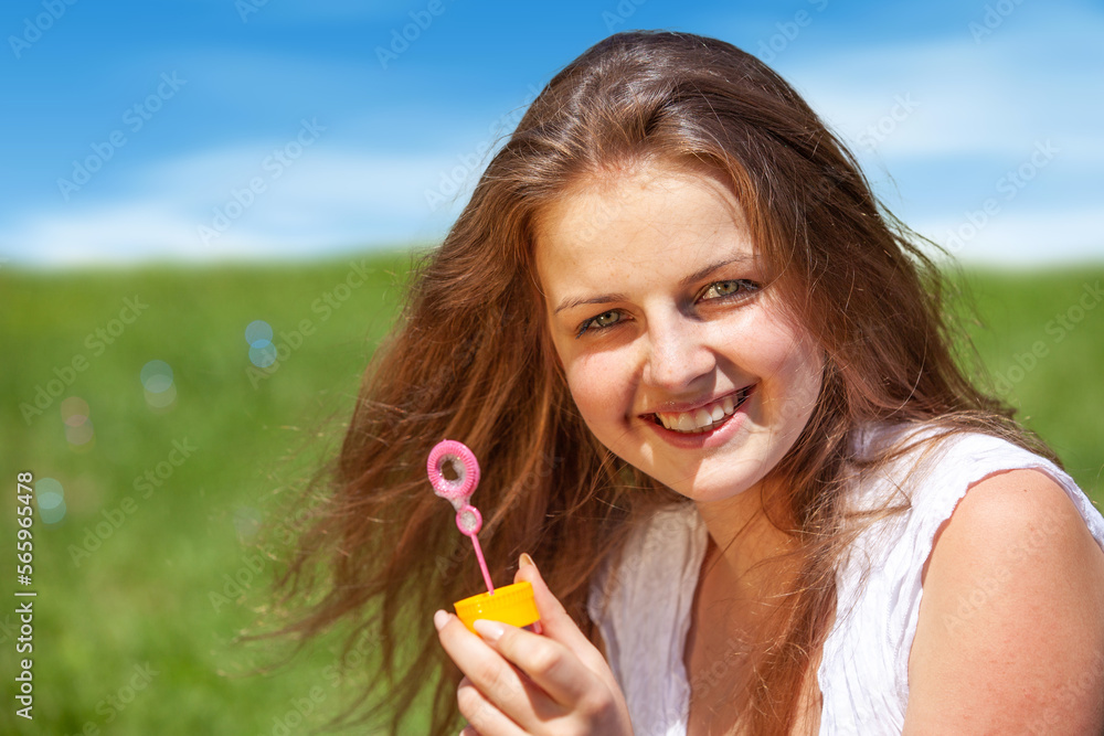 happy girl with soap bubbles in nature happy girl with soap bubbles in nature