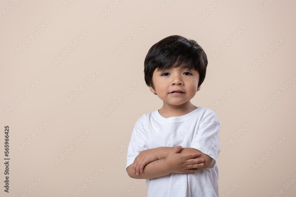 Mexican little boy arms crossed isolated Mexican little boy arms crossed isolated