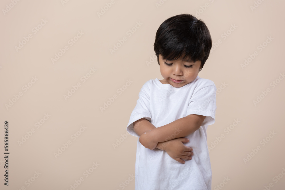 scolded or sad little Mexican boy, sad expression