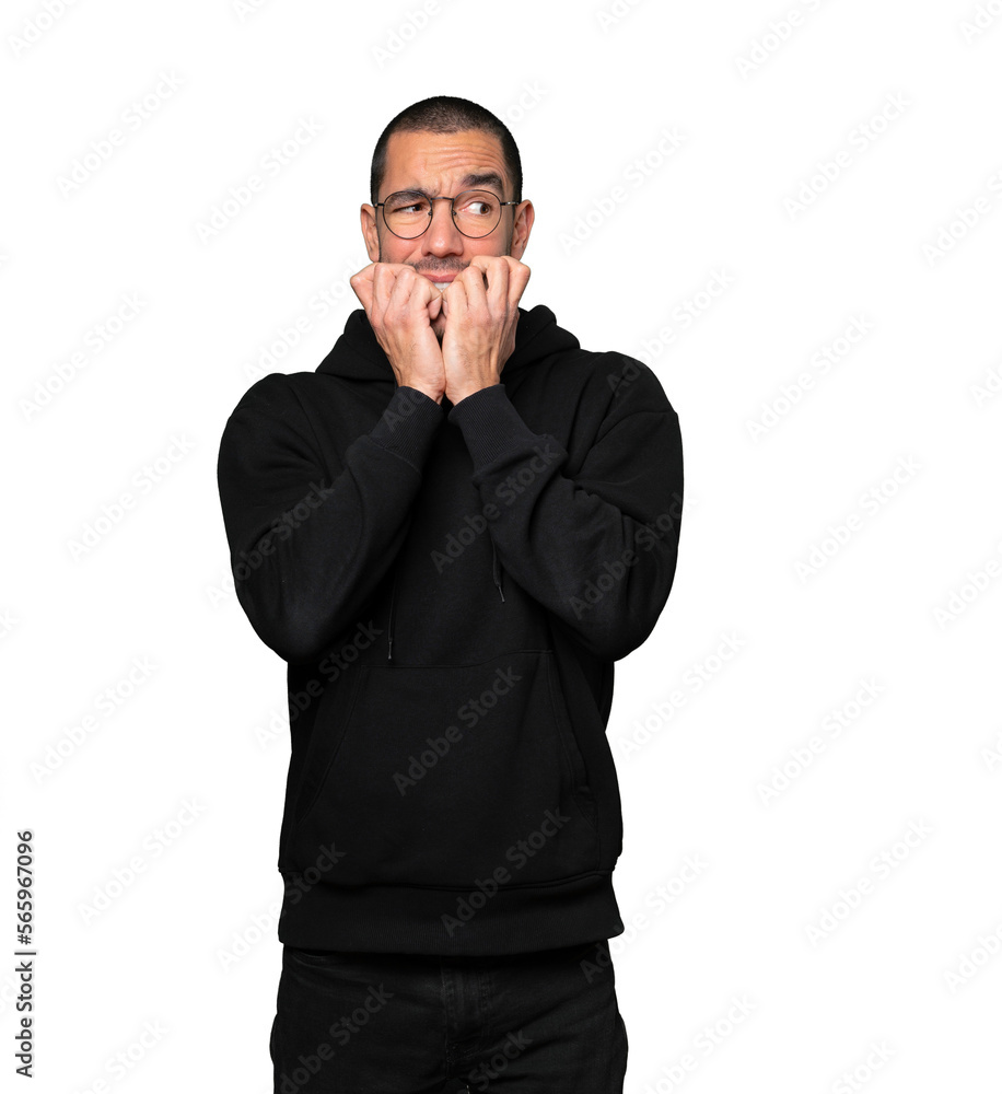 Crazy young man making a nervous gesture Crazy young man making a nervous gesture