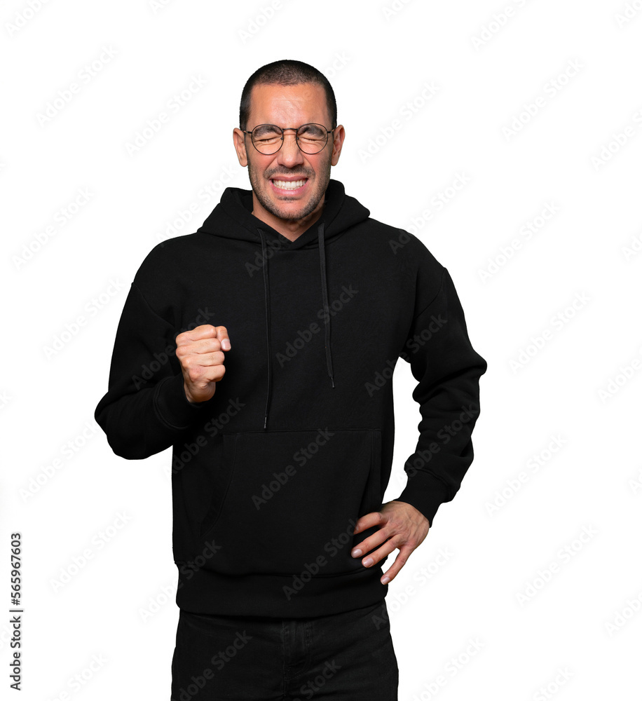 Concerned young man with a stress gesture Concerned young man with a stress gesture