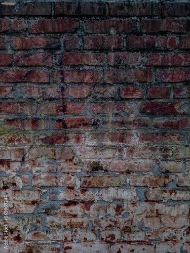 Old brick wall with cracks