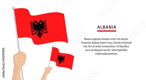 Hand holding Albania flag. Illustration in flat style. Waving flag of Albania isolated. vector illustration