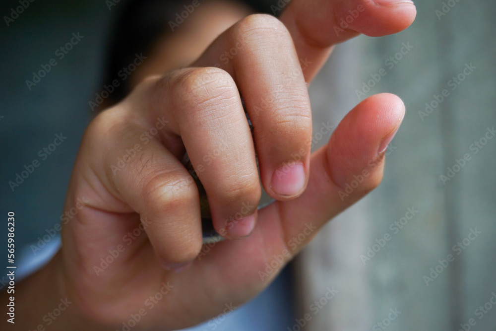 Stock photo of someone who is making a monetary donation Stock photo of someone who is making a monetary donation