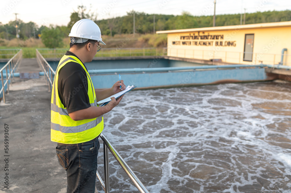 Environmental engineers work at wastewater treatment plants,Water supply engineering working at Water recycling plant for reuse Environmental engineers work at wastewater treatment plants,Water supply engineering working at Water recycling plant for reuse
