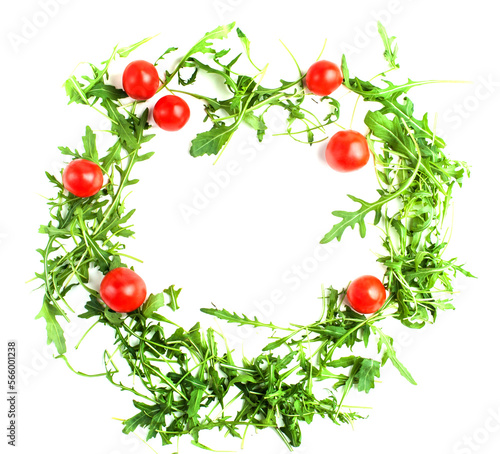 fresh rucola leaves with cherry tomatoes, isolated on white