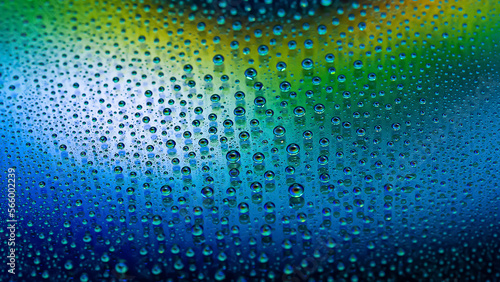 Water drops. Abstract gradient backdrop The texture of the drops. Multicolor gradient. Textured image. Shallow depth of field. Selective focus
