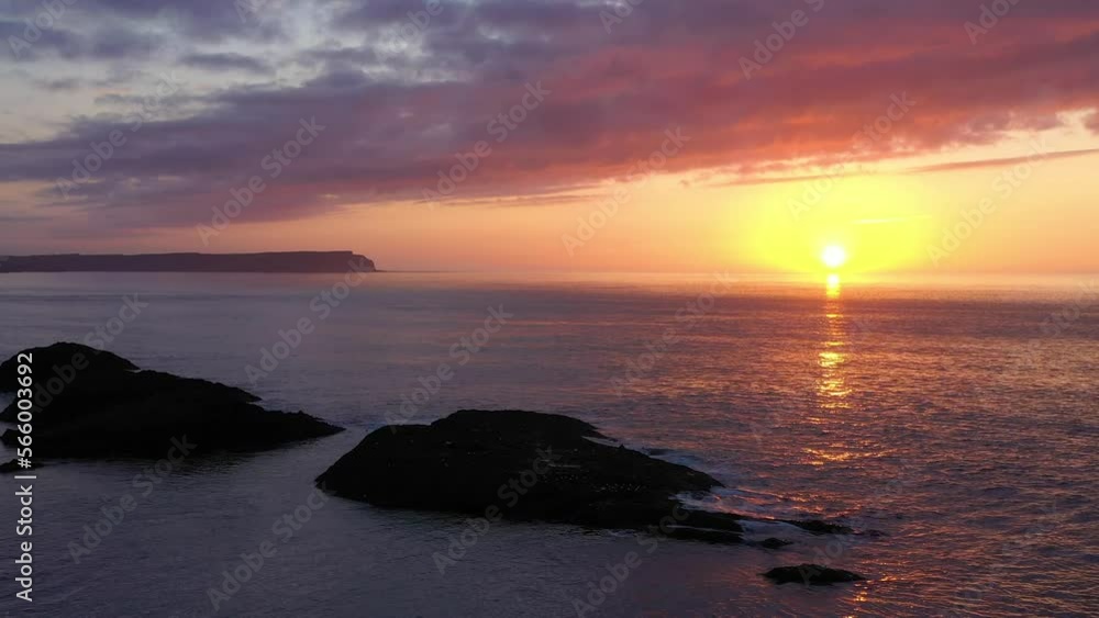 Lovely Sunset over Balintoy Harbour, Antrim, Northern Ireland Lovely Sunset over Balintoy Harbour, Antrim, Northern Ireland