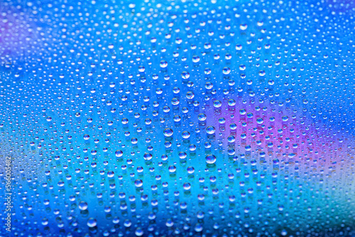 Water drops. Abstract gradient background. Drop texture. Blue gradient. A highly textured image. Shallow depth of field. Selective focu