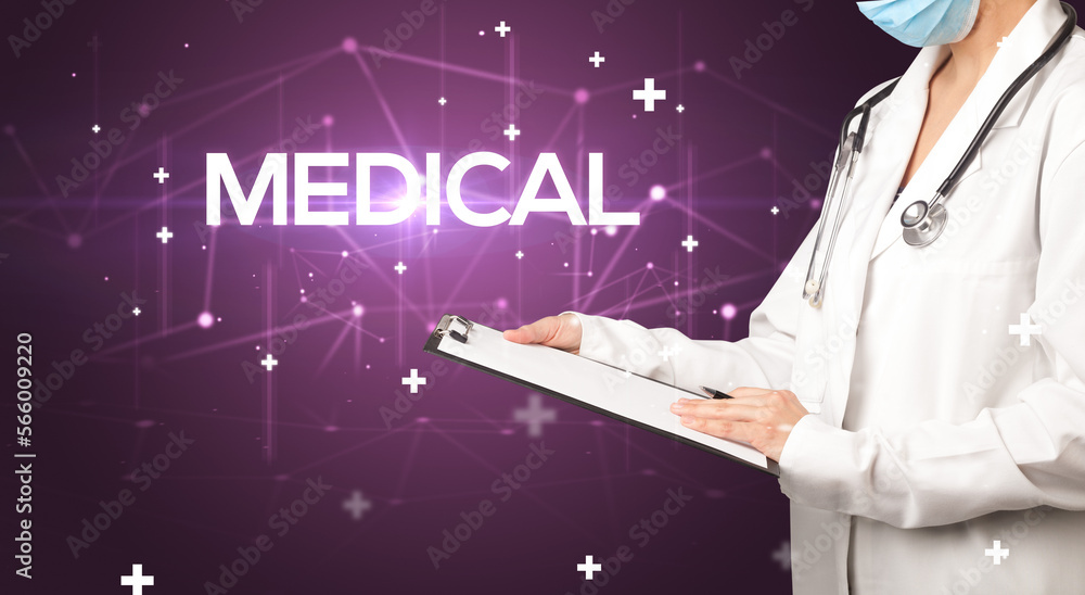 Doctor fills out medical record Doctor fills out medical record