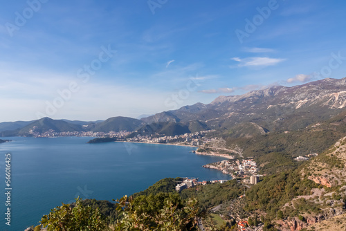 Scenic aerial view of idyllic Bay of Budva seen from Saint Sava, Sveti Stefan, Adriatic Mediterranean Sea, Montenegro, Europe. Summer vacation at seaside surrounded by Dinaric Alps mountains in back