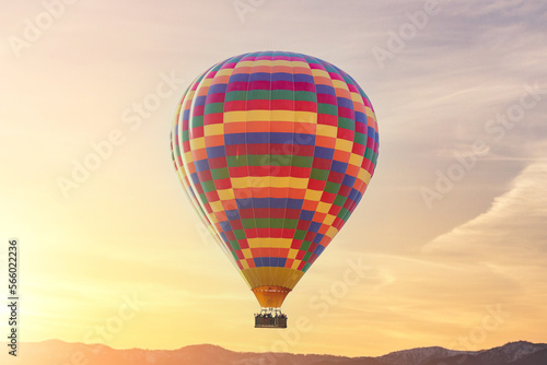 Landscape of fabulous Kapadokya. Colorful flying air balloon in sky at sunrise in Anatolia. Vacations in beautiful destination in Goreme, Turkey
