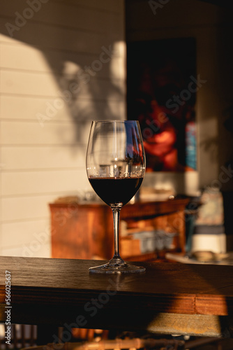 Red wine glass in a restaurant fine dining during sunset evening dinner