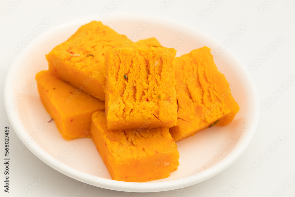 Khoya Kesar Burfi Or Saffron Khoa Barfi Is Milk Based Sweet Made Of Khowa, Condensed Milk, Malai, Mawa. Enjoyed On Holi, Diwali, Rakshabandhan, Janmashtami, Navaratri, Puja, Rakhi, Makar Sankranti Khoya Kesar Burfi Or Saffron Khoa Barfi Is Milk Based Sweet Made Of Khowa, Condensed Milk, Malai, Mawa. Enjoyed On Holi, Diwali, Rakshabandhan, Janmashtami, Navaratri, Puja, Rakhi, Makar Sankranti