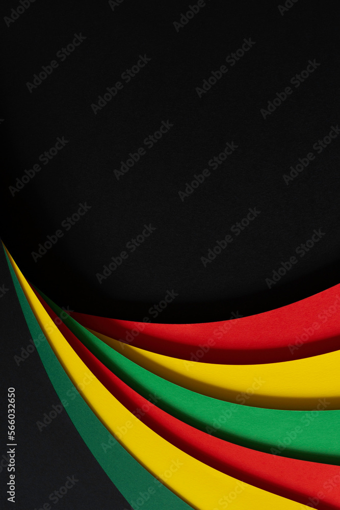 Abstract geometric black, red, yellow, green color paper background