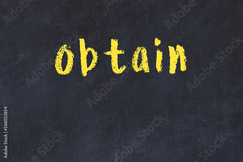 College chalk desk with the word obtain written on in