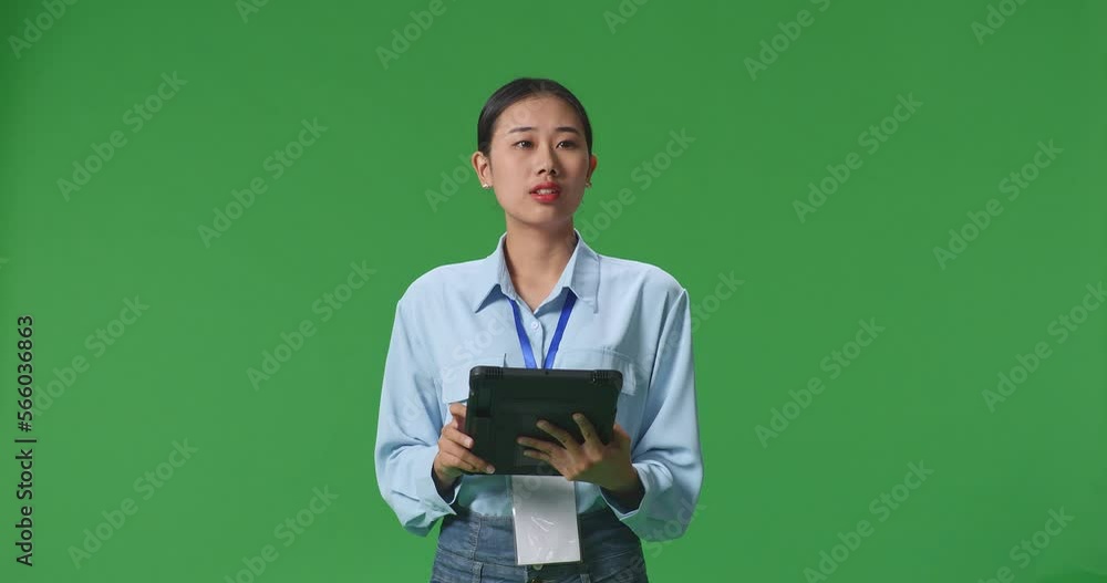 An Asian Business Woman Using Tablet An Looking Around On Green Screen Background In The Studio
An Asian Business Woman Using Tablet An Looking Around On Green Screen Background In The Studio
