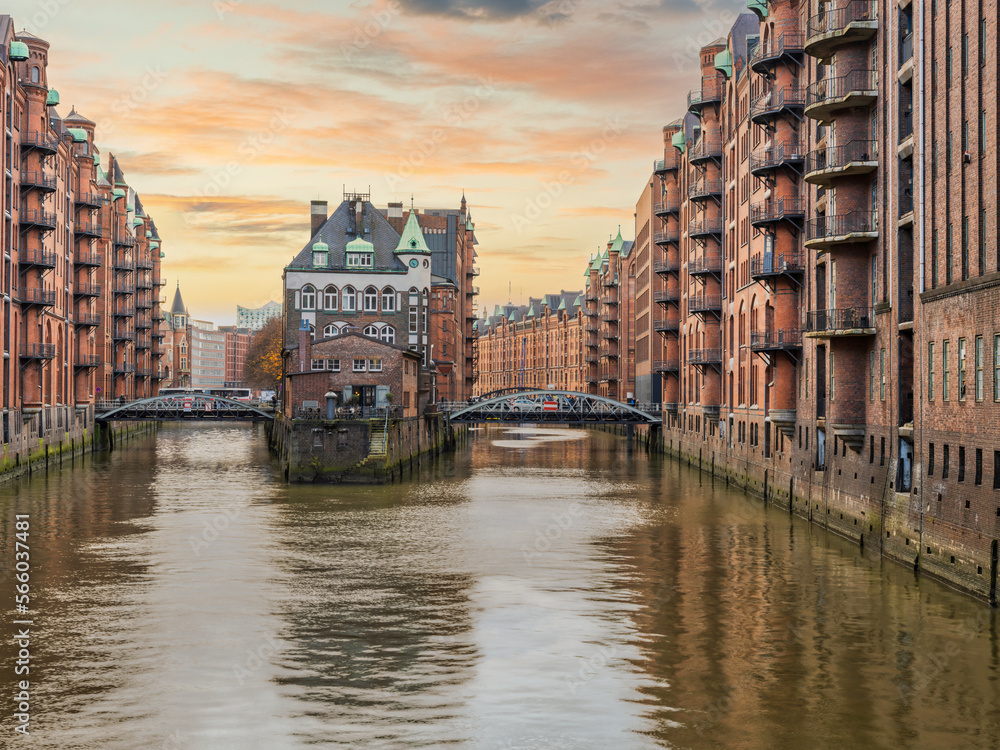 The Warehouse District Speicherstadt during a sunset golden sky in Hamburg, Germany