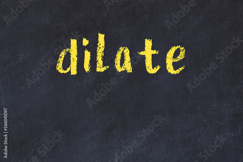 Slika na platnu College chalk desk with the word dilate written on in