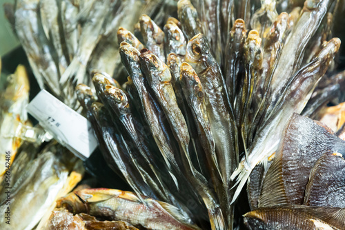 Cured herring and other fish in supermarket. High quality photo