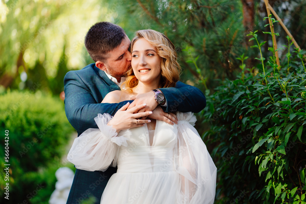beautiful and loving bride and groom hugging. beautiful and loving bride and groom hugging.