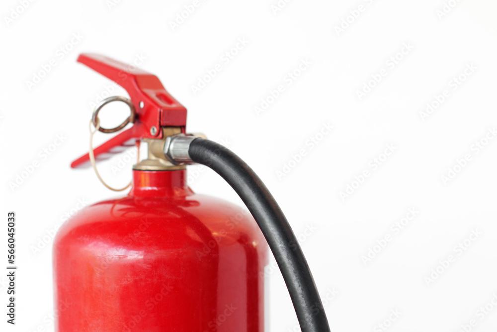 Fire extinguisher used to put out fires during an emergency, on an isolated white background, close-up Fire extinguisher used to put out fires during an emergency, on an isolated white background, close-up