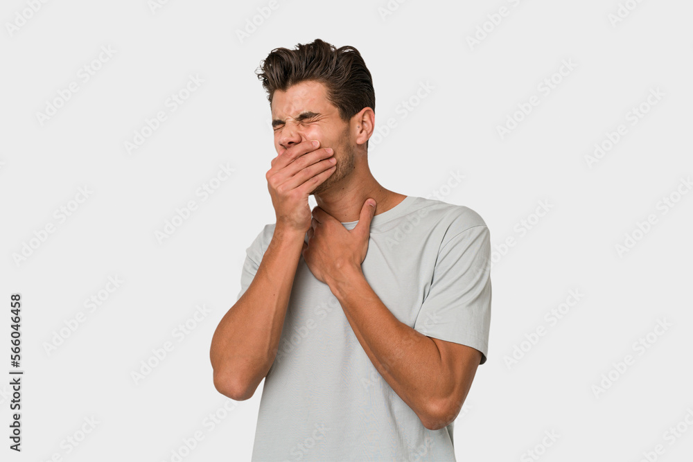 Young handsome caucasian man isolated on white background suffers pain in throat due a virus or infection. Young handsome caucasian man isolated on white background suffers pain in throat due a virus or infection.